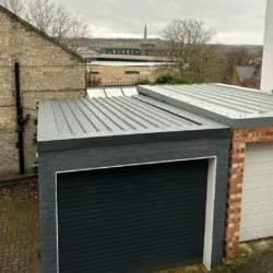 Newly install flat steel garage roof