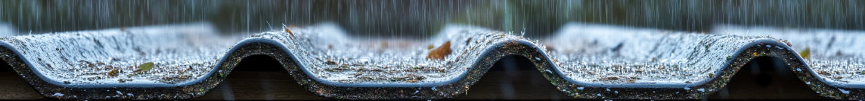 Old leaking asbestos roof in storm