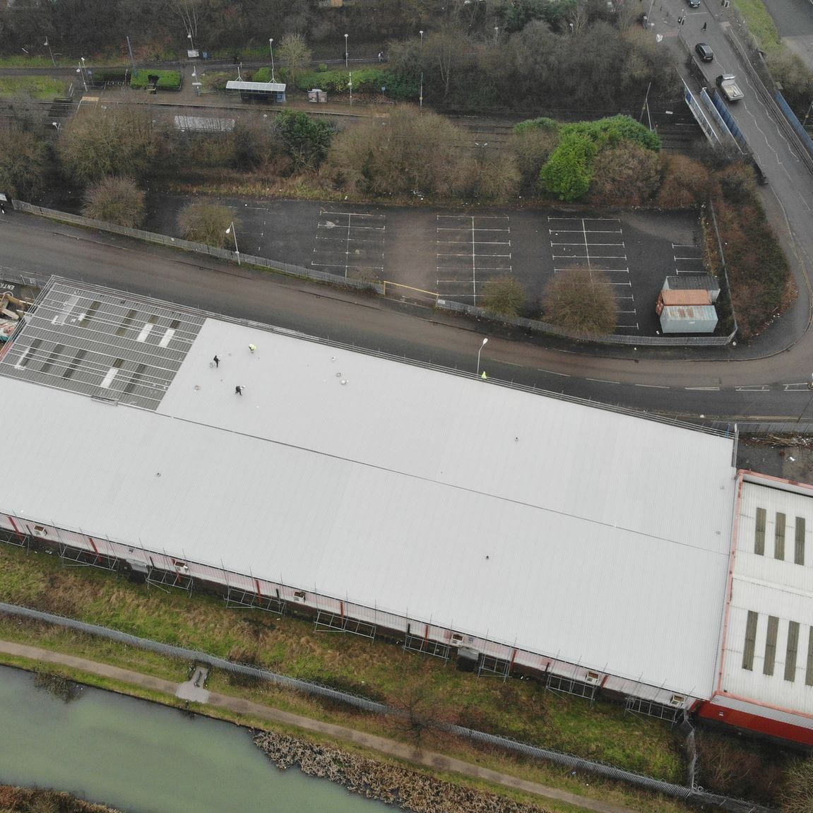 Drone photo of an in-progress warehouse roof replacement in Birmingham