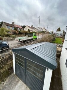 Completed single garage roof replacement in Derby, February 2025, side angle
